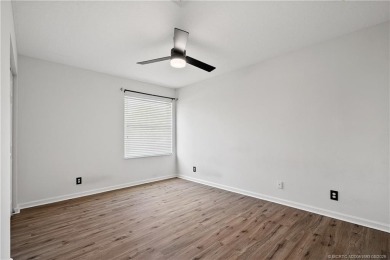 STUNNING 3-bed + bonus loft home in Jensen Beach Country Club on Eagle Marsh Golf Club in Florida - for sale on GolfHomes.com, golf home, golf lot