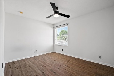 STUNNING 3-bed + bonus loft home in Jensen Beach Country Club on Eagle Marsh Golf Club in Florida - for sale on GolfHomes.com, golf home, golf lot