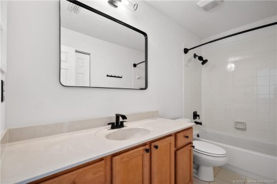 STUNNING 3-bed + bonus loft home in Jensen Beach Country Club on Eagle Marsh Golf Club in Florida - for sale on GolfHomes.com, golf home, golf lot