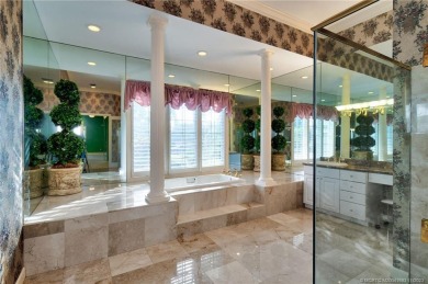 This beautiful Estate home makes a statement as soon as it comes on Willoughby Golf Club in Florida - for sale on GolfHomes.com, golf home, golf lot
