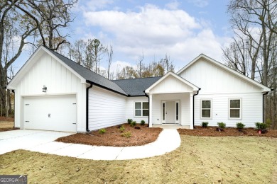 This NEW Construction home is now ready for you to move in on Cabin Creek Golf Club in Georgia - for sale on GolfHomes.com, golf home, golf lot