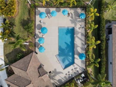 STUNNING 3-bed + bonus loft home in Jensen Beach Country Club on Eagle Marsh Golf Club in Florida - for sale on GolfHomes.com, golf home, golf lot