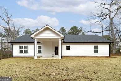 This NEW Construction home is now ready for you to move in on Cabin Creek Golf Club in Georgia - for sale on GolfHomes.com, golf home, golf lot