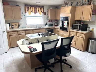 This meticulously maintained 2-bedroom, 2-bathroom home offers on Crystal Lake Club in Florida - for sale on GolfHomes.com, golf home, golf lot