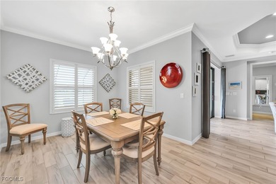 Picture mornings at the breakfast bar, gas flame on, sunlight on Heritage Palms Golf and Country Club in Florida - for sale on GolfHomes.com, golf home, golf lot