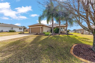 This beautifully maintained original-owner home features a 27' on Eagle Ridge At Spruce Creek Country Club in Florida - for sale on GolfHomes.com, golf home, golf lot