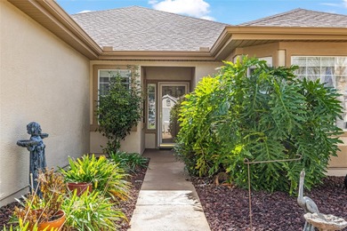 This beautifully maintained original-owner home features a 27' on Eagle Ridge At Spruce Creek Country Club in Florida - for sale on GolfHomes.com, golf home, golf lot