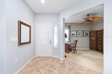 This beautifully maintained original-owner home features a 27' on Eagle Ridge At Spruce Creek Country Club in Florida - for sale on GolfHomes.com, golf home, golf lot