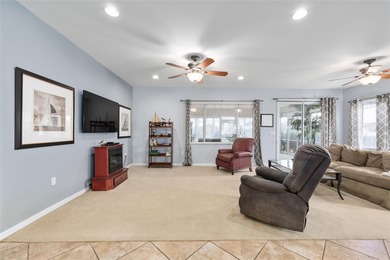 This beautifully maintained original-owner home features a 27' on Eagle Ridge At Spruce Creek Country Club in Florida - for sale on GolfHomes.com, golf home, golf lot
