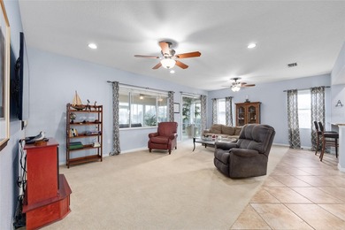 This beautifully maintained original-owner home features a 27' on Eagle Ridge At Spruce Creek Country Club in Florida - for sale on GolfHomes.com, golf home, golf lot