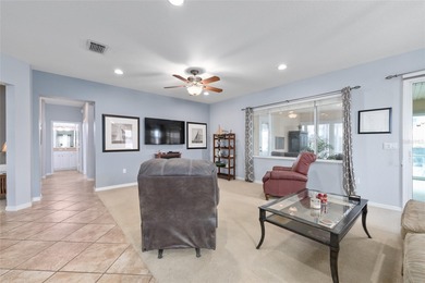This beautifully maintained original-owner home features a 27' on Eagle Ridge At Spruce Creek Country Club in Florida - for sale on GolfHomes.com, golf home, golf lot