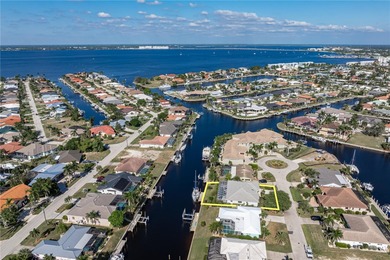 WATERFRONT HOME IN PGI W/**NEW TILE ROOF** & NEARLY INSTANT on Saint Andrews South Golf Club in Florida - for sale on GolfHomes.com, golf home, golf lot