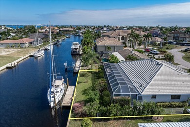 WATERFRONT HOME IN PGI W/**NEW TILE ROOF** & NEARLY INSTANT on Saint Andrews South Golf Club in Florida - for sale on GolfHomes.com, golf home, golf lot