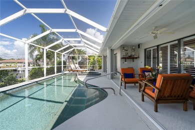 WATERFRONT HOME IN PGI W/**NEW TILE ROOF** & NEARLY INSTANT on Saint Andrews South Golf Club in Florida - for sale on GolfHomes.com, golf home, golf lot