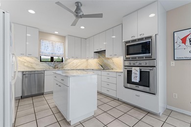 WATERFRONT HOME IN PGI W/**NEW TILE ROOF** & NEARLY INSTANT on Saint Andrews South Golf Club in Florida - for sale on GolfHomes.com, golf home, golf lot