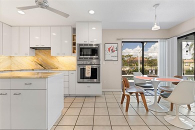 WATERFRONT HOME IN PGI W/**NEW TILE ROOF** & NEARLY INSTANT on Saint Andrews South Golf Club in Florida - for sale on GolfHomes.com, golf home, golf lot