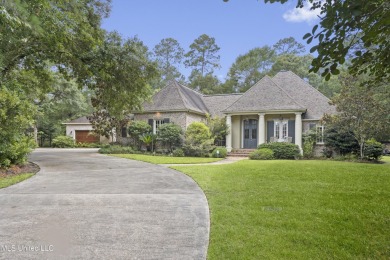 This beautifully appointed 3-bedroom, 2.5-bath home is the on Diamondhead Country Club in Mississippi - for sale on GolfHomes.com, golf home, golf lot