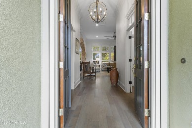 This beautifully appointed 3-bedroom, 2.5-bath home is the on Diamondhead Country Club in Mississippi - for sale on GolfHomes.com, golf home, golf lot