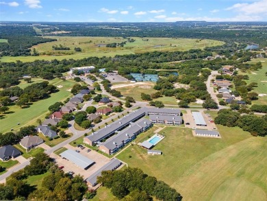 The Fairway Condominiums, located in the country club community on Pecan Plantation Country Club in Texas - for sale on GolfHomes.com, golf home, golf lot