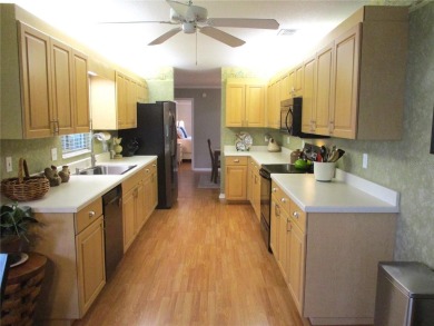 DESIGNER SYLISH MOVE IN READY HOME WITH A TROPICAL PARADISE on Preserve Golf Club in Florida - for sale on GolfHomes.com, golf home, golf lot