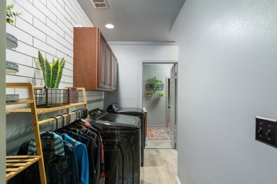 Contemporary-style residence with custom finishes, quality on Waikoloa Village Golf Club in Hawaii - for sale on GolfHomes.com, golf home, golf lot