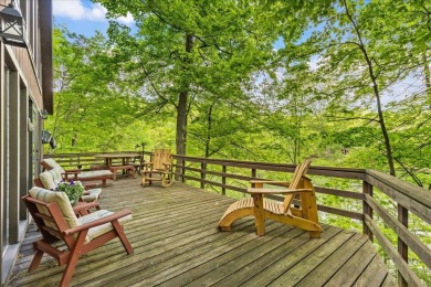 Charming Lakefront Cabin tucked away in the woods overlooking on Hide-A-Way Hills Golf Club in Ohio - for sale on GolfHomes.com, golf home, golf lot