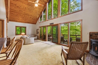 Charming Lakefront Cabin tucked away in the woods overlooking on Hide-A-Way Hills Golf Club in Ohio - for sale on GolfHomes.com, golf home, golf lot