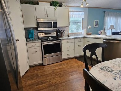 Welcome to this beautifully maintained 2 bedroom, 2 bathroom on Crystal Lake Club in Florida - for sale on GolfHomes.com, golf home, golf lot