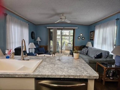 Welcome to this beautifully maintained 2 bedroom, 2 bathroom on Crystal Lake Club in Florida - for sale on GolfHomes.com, golf home, golf lot