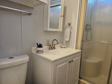 Welcome to this beautifully maintained 2 bedroom, 2 bathroom on Crystal Lake Club in Florida - for sale on GolfHomes.com, golf home, golf lot