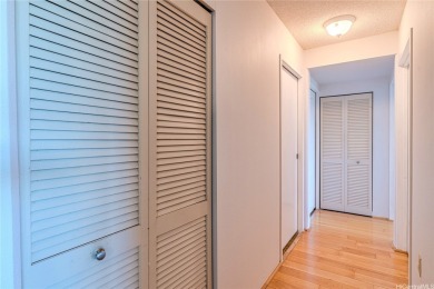 TWO PARKING STALLS and stunning golf course views set this on Honolulu Country Club in Hawaii - for sale on GolfHomes.com, golf home, golf lot