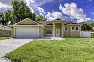 This newly remodeled 3-bedroom, 3-bathroom home in the desirable on The Grand Club - Pine Lakes Course in Florida - for sale on GolfHomes.com, golf home, golf lot