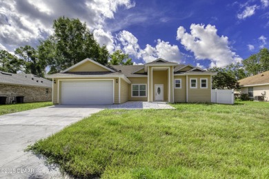 This newly remodeled 3-bedroom, 3-bathroom home in the desirable on The Grand Club - Pine Lakes Course in Florida - for sale on GolfHomes.com, golf home, golf lot