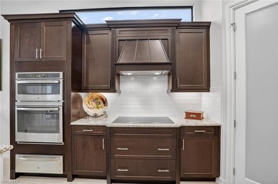 *Live the Naples Lifestyle* in this awesome Stock-built home on The Club At Olde Cypress in Florida - for sale on GolfHomes.com, golf home, golf lot