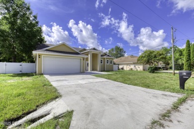 This newly remodeled 3-bedroom, 3-bathroom home in the desirable on The Grand Club - Pine Lakes Course in Florida - for sale on GolfHomes.com, golf home, golf lot