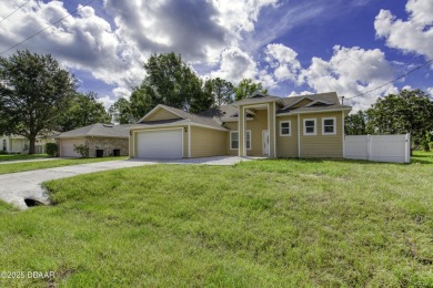 This newly remodeled 3-bedroom, 3-bathroom home in the desirable on The Grand Club - Pine Lakes Course in Florida - for sale on GolfHomes.com, golf home, golf lot