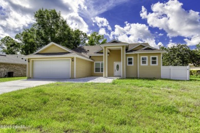 This newly remodeled 3-bedroom, 3-bathroom home in the desirable on The Grand Club - Pine Lakes Course in Florida - for sale on GolfHomes.com, golf home, golf lot
