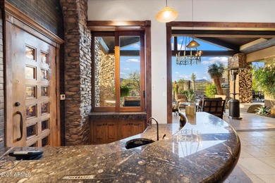 Beautifully crafted by Cullum Homes, this 7,468 sq ft estate in on Desert Mountain - Outlaw Golf Course in Arizona - for sale on GolfHomes.com, golf home, golf lot
