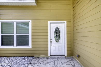 This newly remodeled 3-bedroom, 3-bathroom home in the desirable on The Grand Club - Pine Lakes Course in Florida - for sale on GolfHomes.com, golf home, golf lot