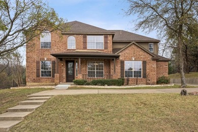 Discover the perfect blend of privacy, nature, and upscale on Tangle Ridge Golf Club in Texas - for sale on GolfHomes.com, golf home, golf lot