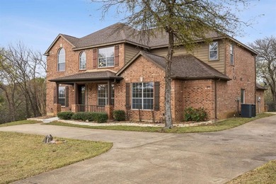 Discover the perfect blend of privacy, nature, and upscale on Tangle Ridge Golf Club in Texas - for sale on GolfHomes.com, golf home, golf lot