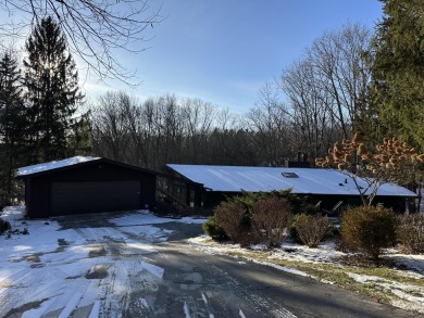 Exceptional architect-designed home, beautifully remodeled in on Barton Hills Country Club in Michigan - for sale on GolfHomes.com, golf home, golf lot