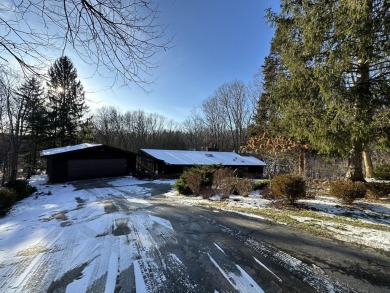 Exceptional architect-designed home, beautifully remodeled in on Barton Hills Country Club in Michigan - for sale on GolfHomes.com, golf home, golf lot