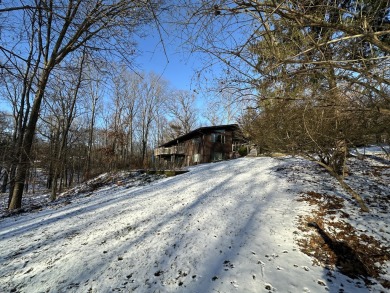 Exceptional architect-designed home, beautifully remodeled in on Barton Hills Country Club in Michigan - for sale on GolfHomes.com, golf home, golf lot