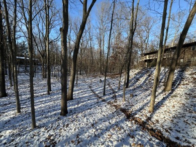 Exceptional architect-designed home, beautifully remodeled in on Barton Hills Country Club in Michigan - for sale on GolfHomes.com, golf home, golf lot