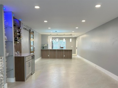 Beautifully renovated 2-bedroom, 2-bath first-floor corner unit on Wynmoor Golf Course in Florida - for sale on GolfHomes.com, golf home, golf lot