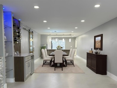 Beautifully renovated 2-bedroom, 2-bath first-floor corner unit on Wynmoor Golf Course in Florida - for sale on GolfHomes.com, golf home, golf lot