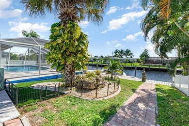 DISCOVER THE WATERFRONT LIFESTYLE YOU'VE BEEN DREAMING OF on El Rio Golf Course and Club in Florida - for sale on GolfHomes.com, golf home, golf lot