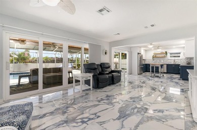 DISCOVER THE WATERFRONT LIFESTYLE YOU'VE BEEN DREAMING OF on El Rio Golf Course and Club in Florida - for sale on GolfHomes.com, golf home, golf lot