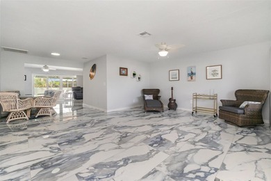 DISCOVER THE WATERFRONT LIFESTYLE YOU'VE BEEN DREAMING OF on El Rio Golf Course and Club in Florida - for sale on GolfHomes.com, golf home, golf lot